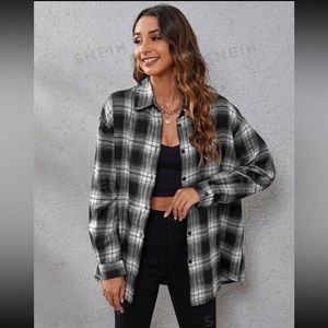 Black and white plaid button-down shirt, size medium